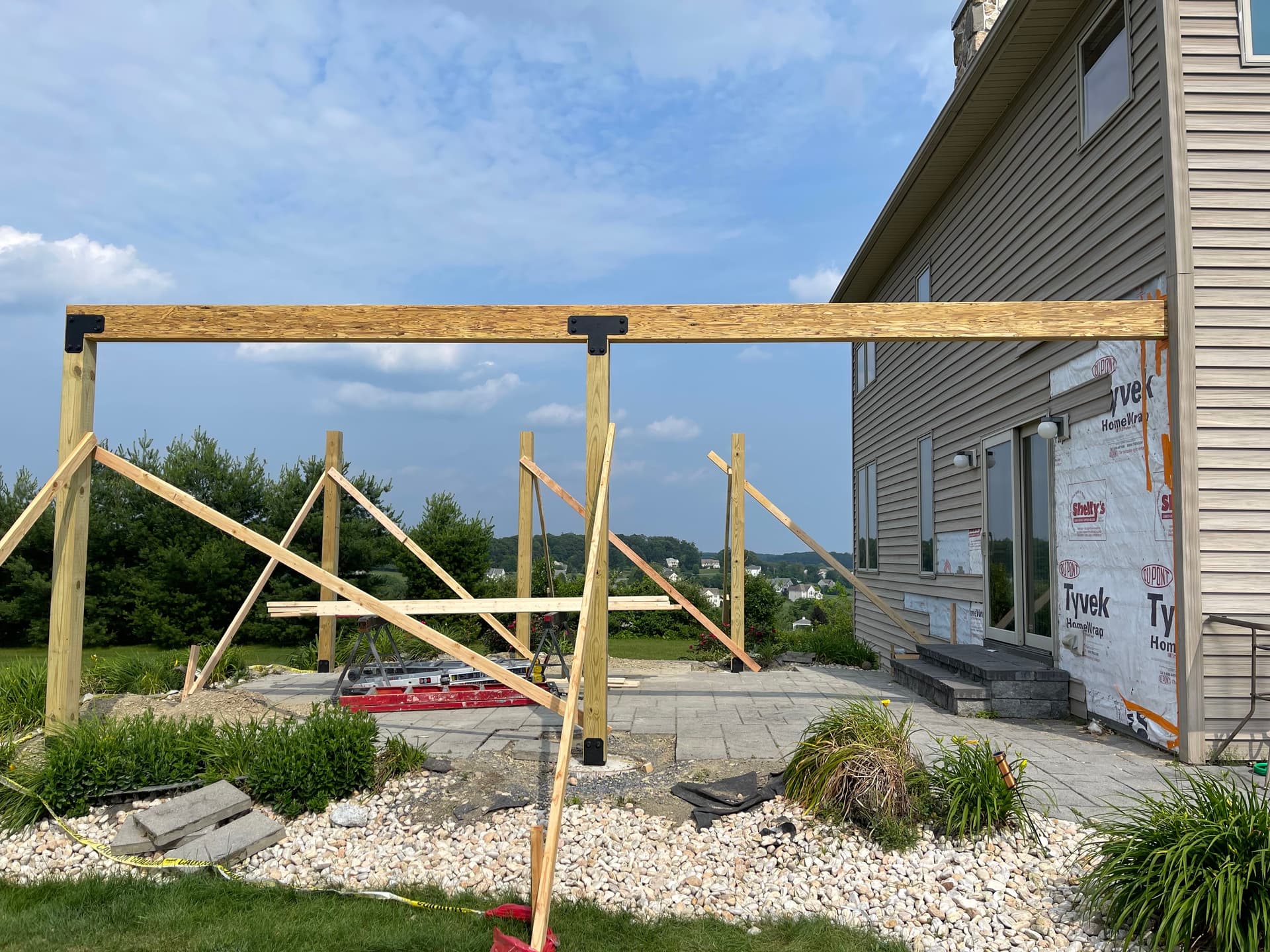 Patio construction and base prep work in progress.