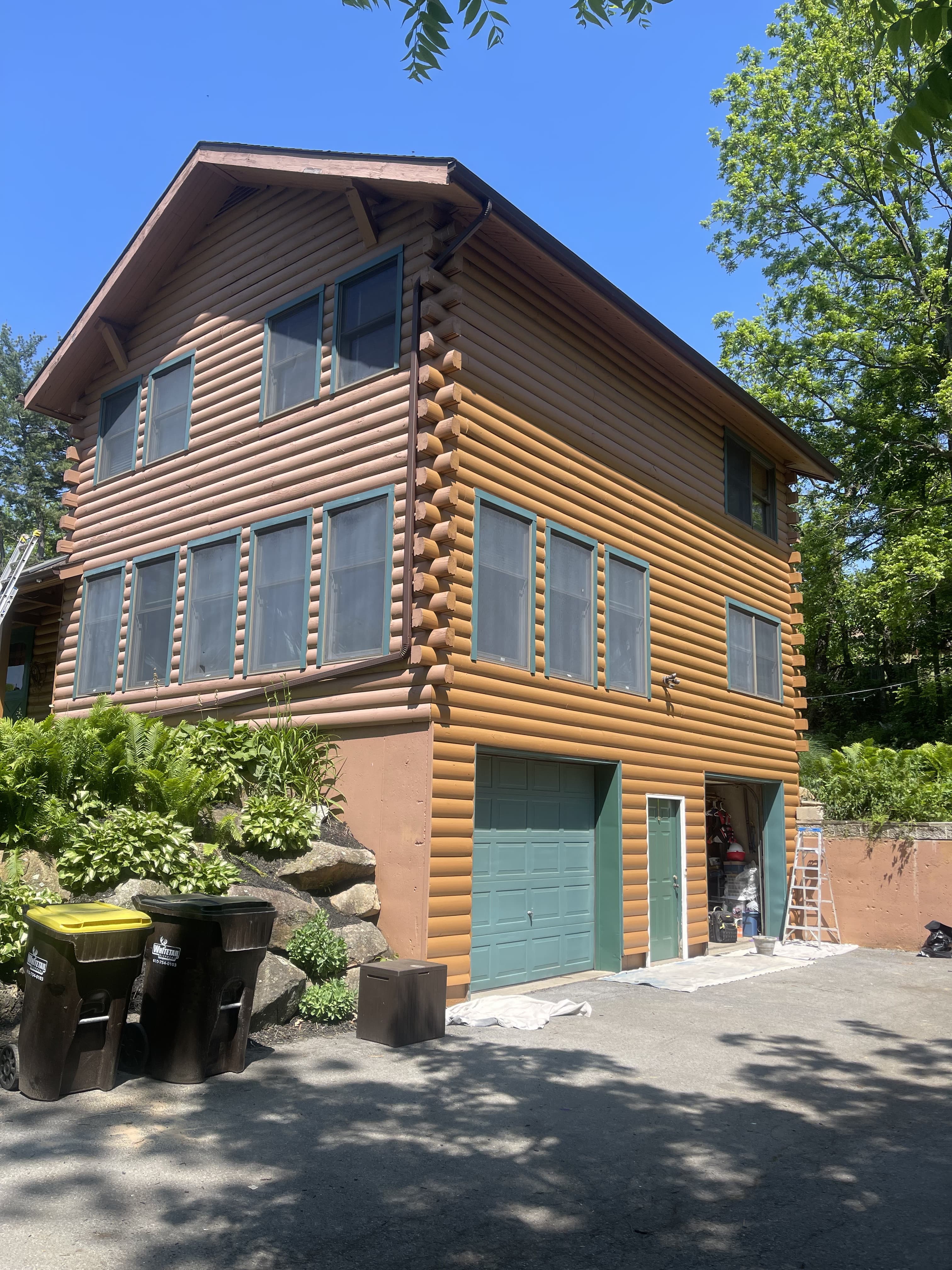 Finished log-style home exterior after remodeling work in Allentown.