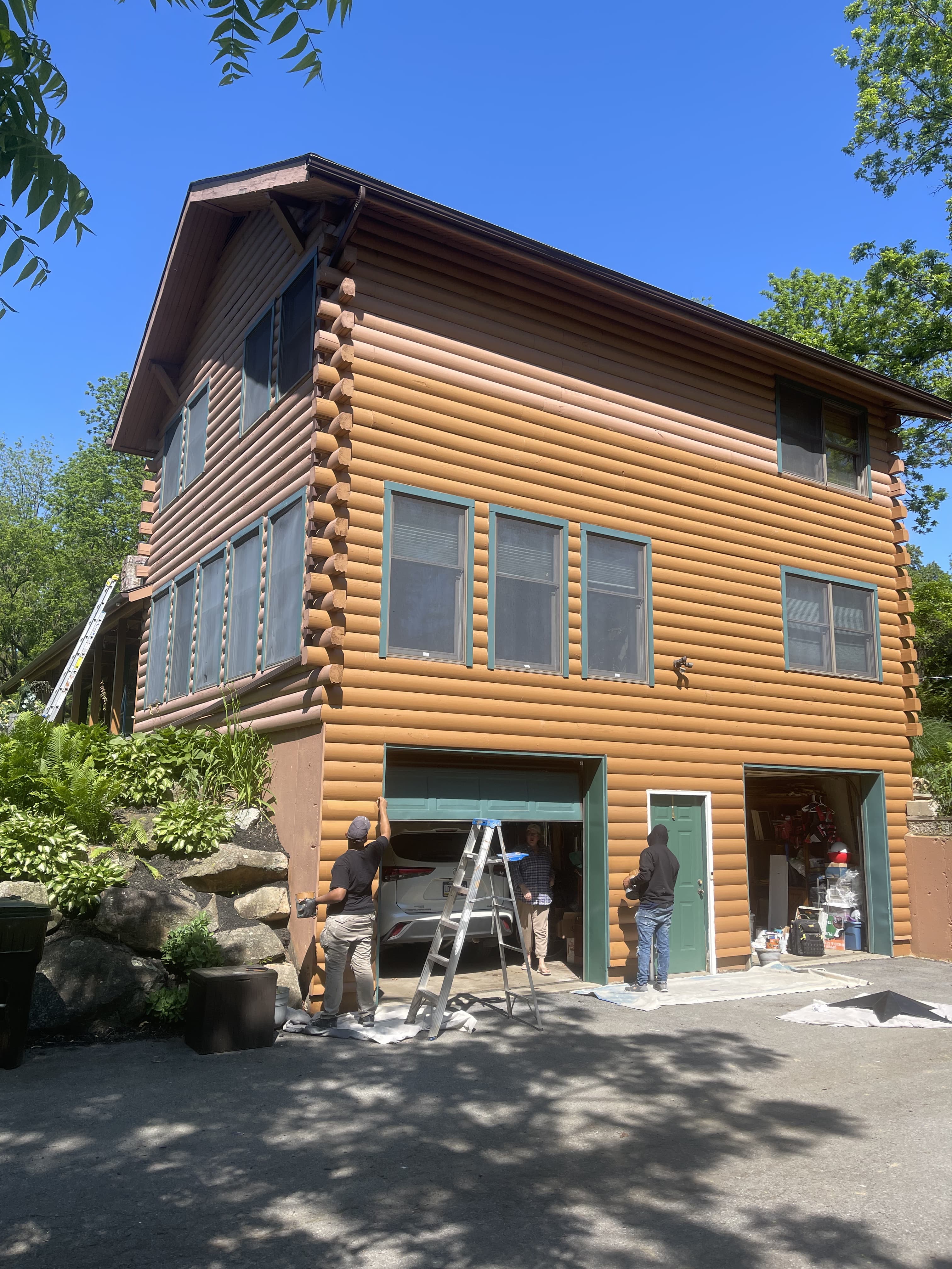 Garage-side exterior elevation during remodeling work on a log-style home in Allentown.