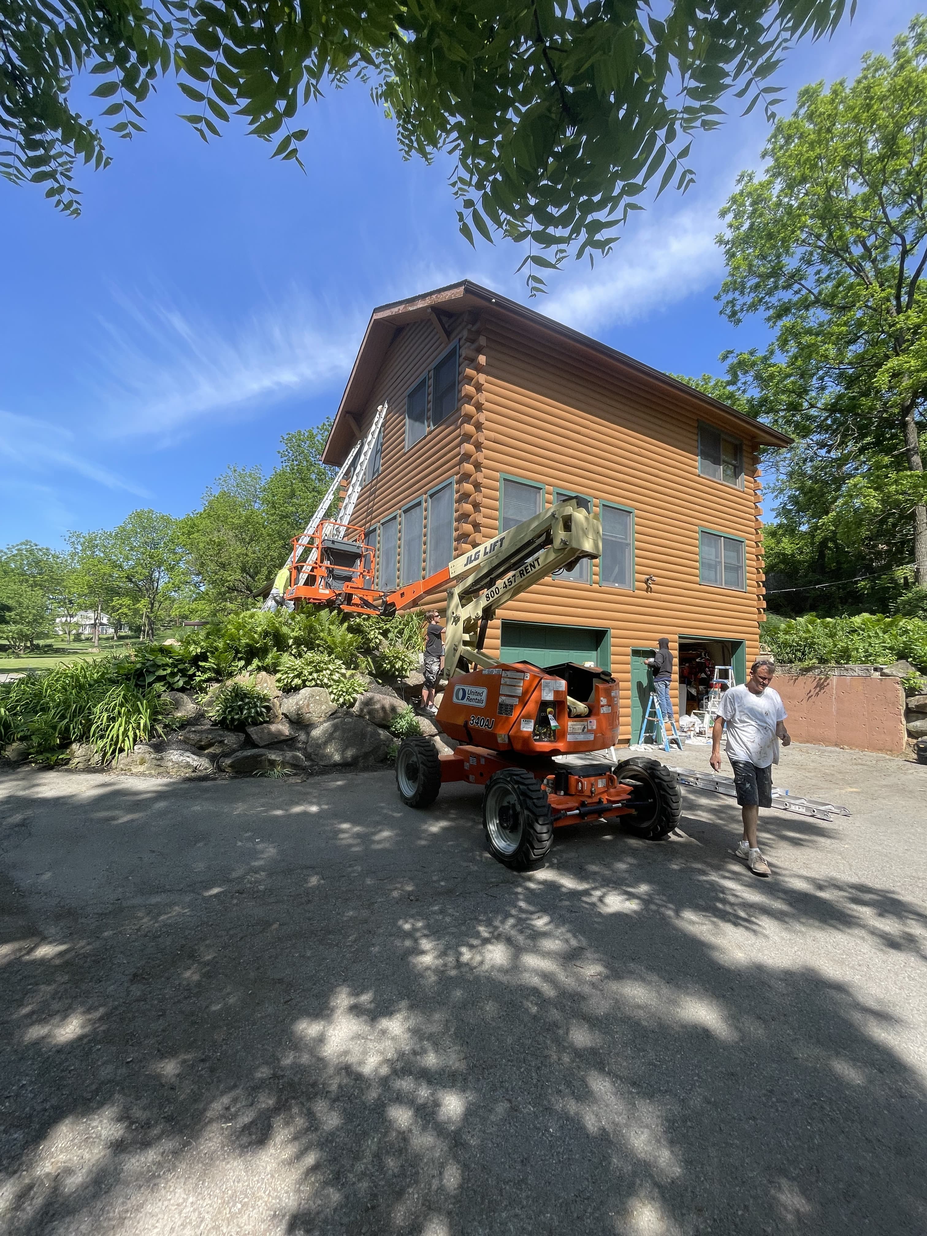 Lift-access exterior remodeling work underway on an Allentown home.
