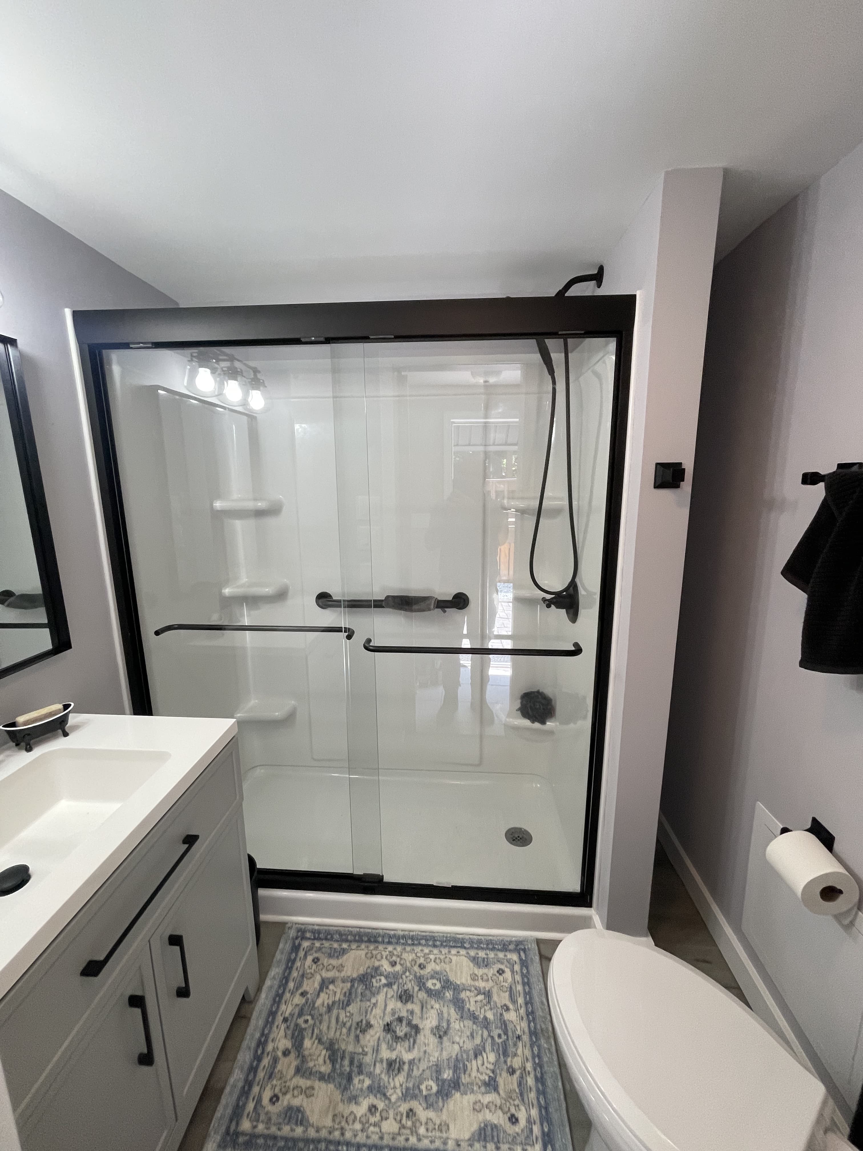 Finished bathroom shower enclosure after remodel.