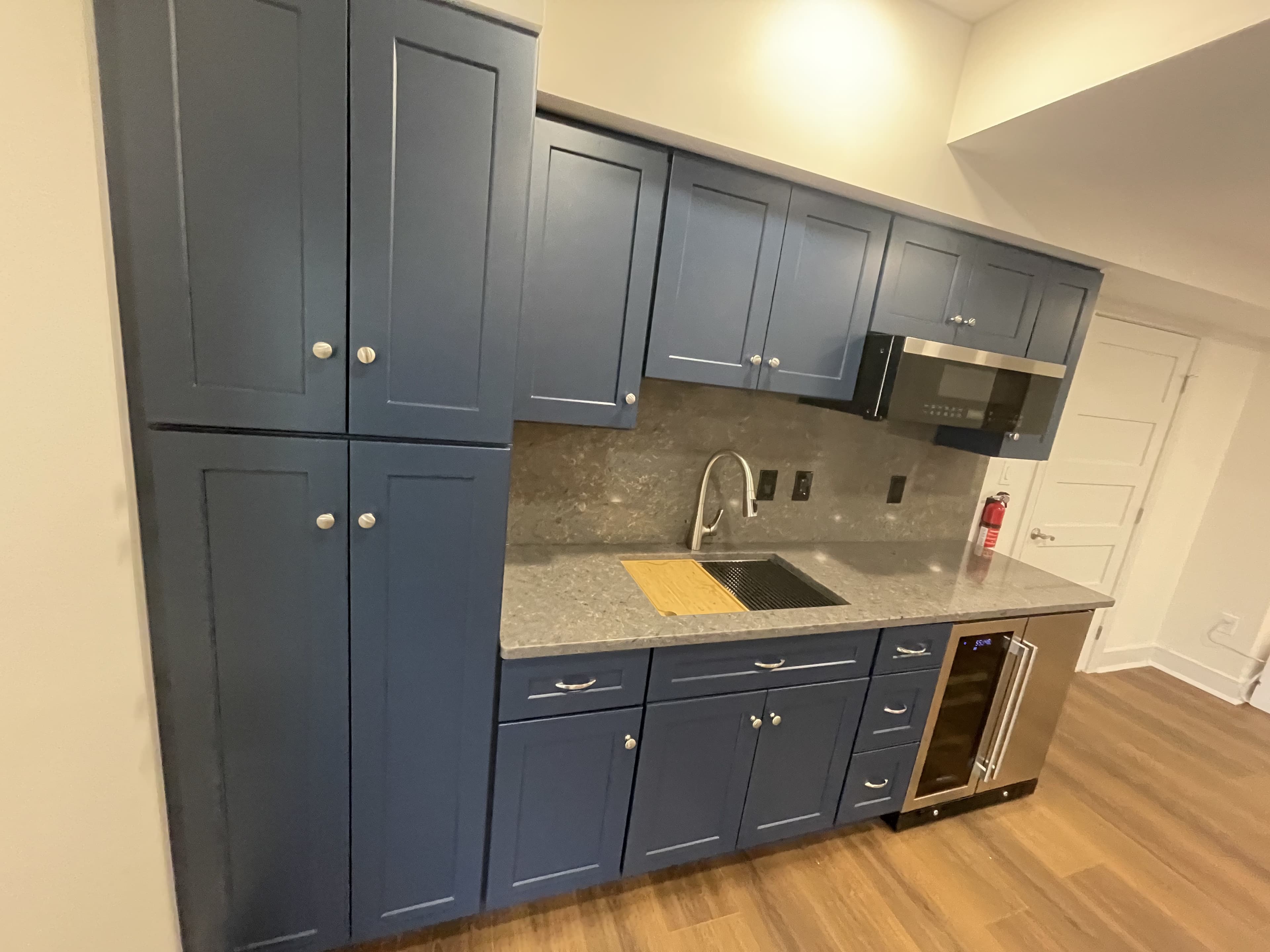 Kitchen after cabinet and counter upgrade.