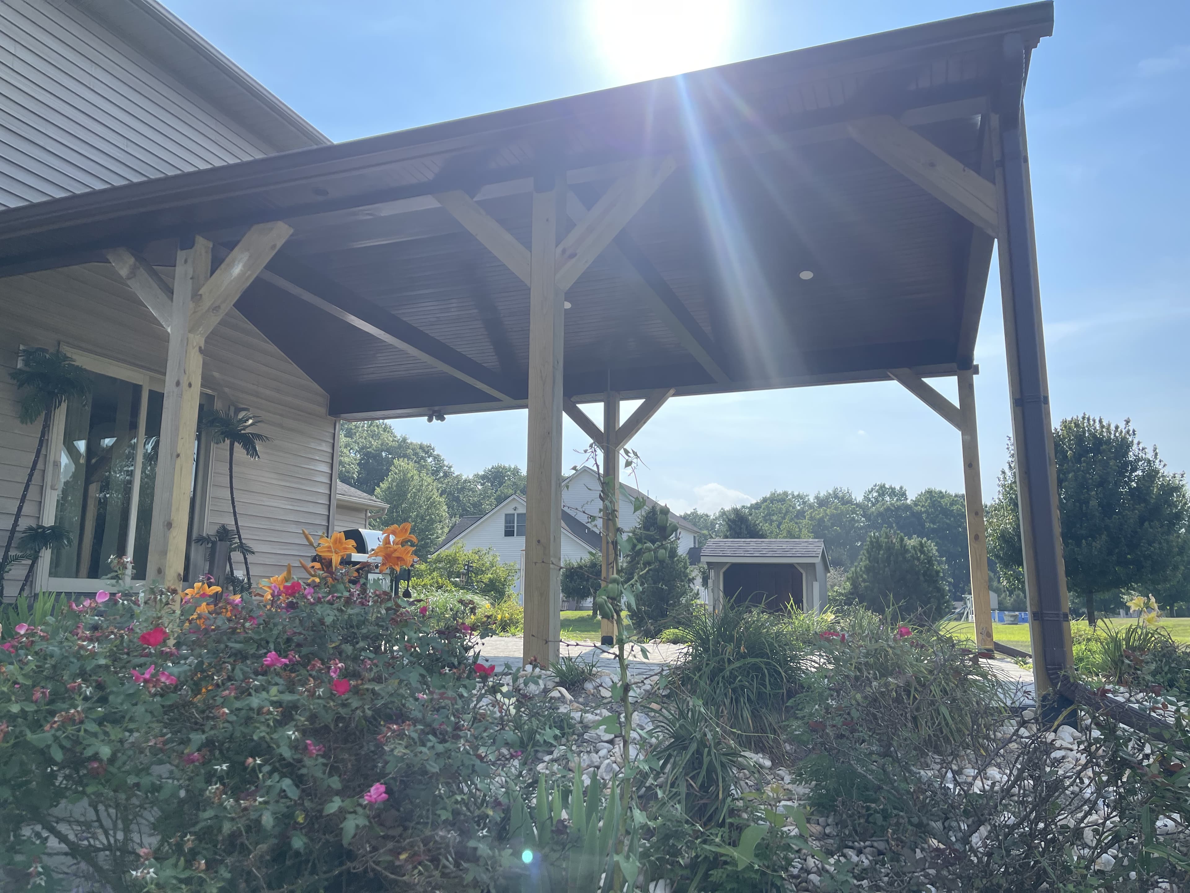 Finished hardscape and pavilion wood ceiling detail.