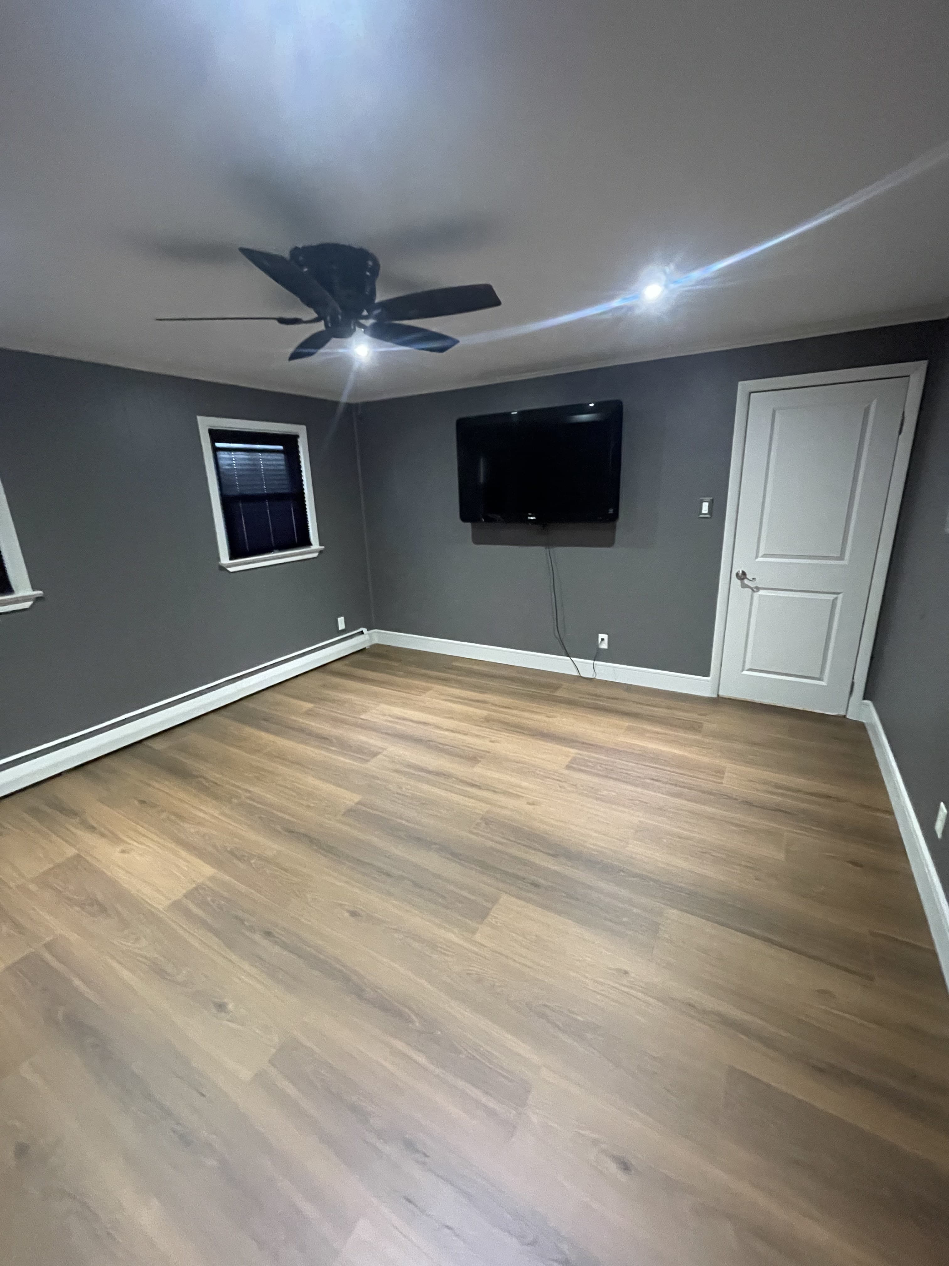 Bedroom interior refresh after updated blue wall color and finished trim.