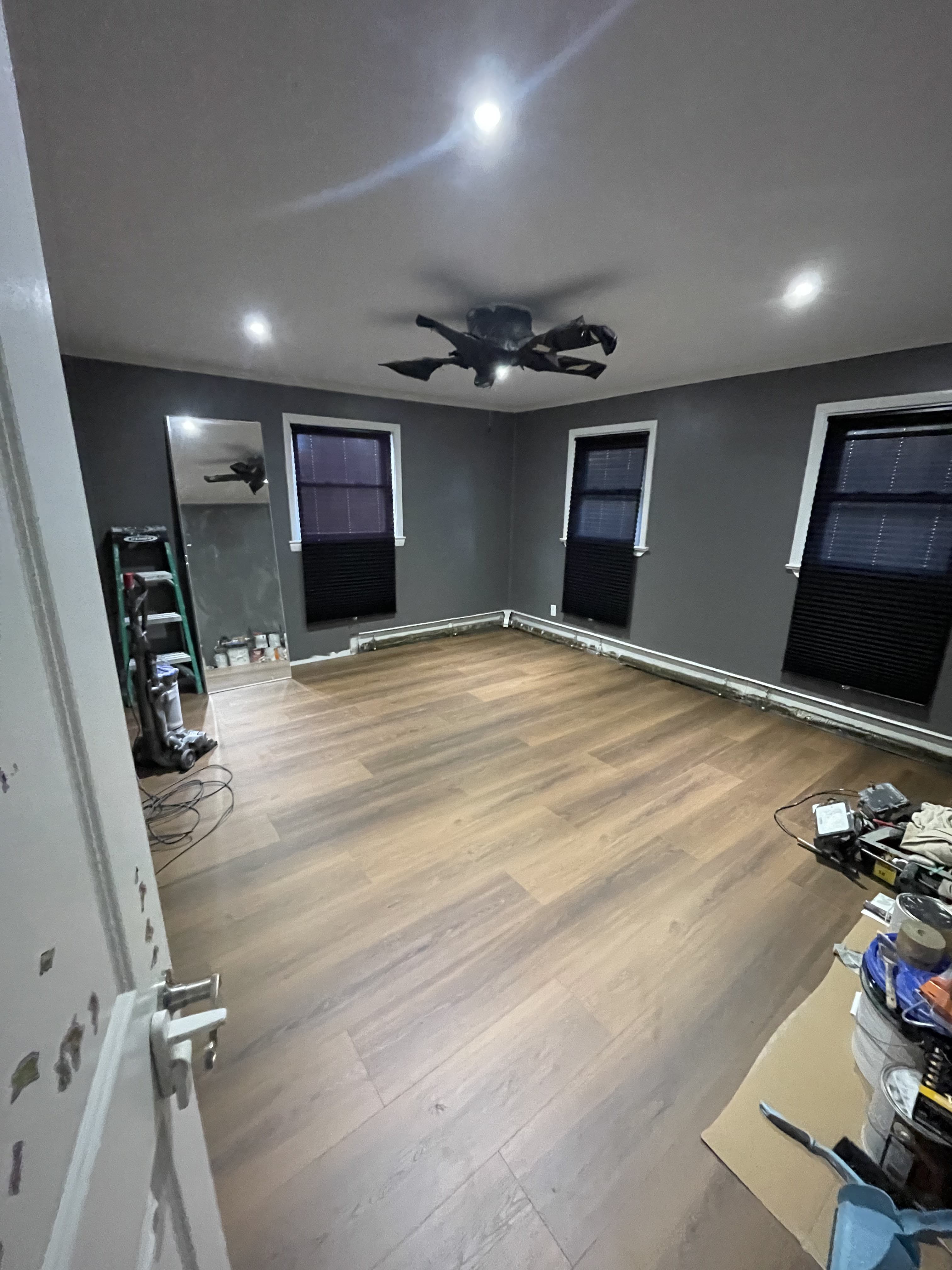Bedroom refresh in progress during paint and finish prep.