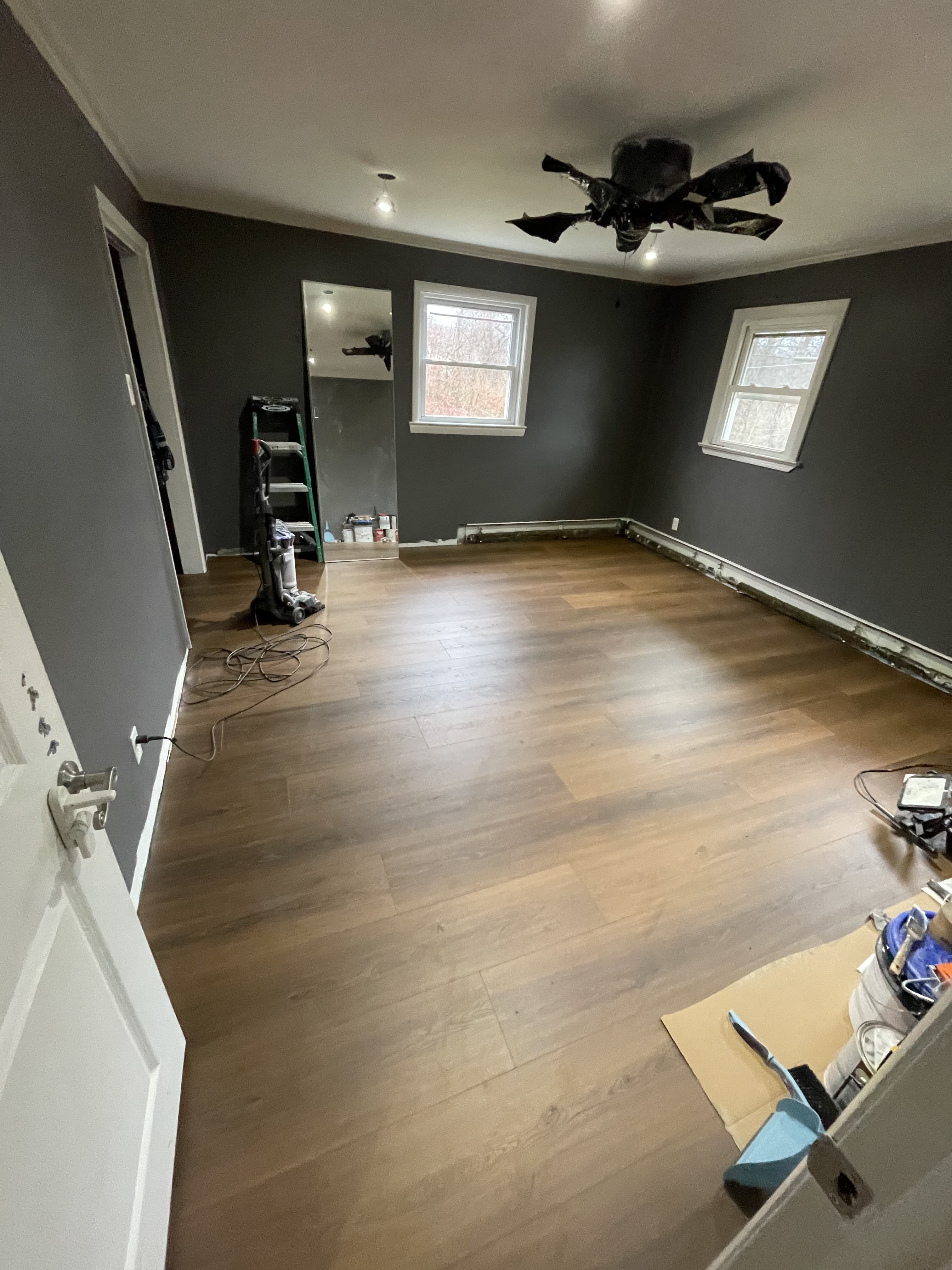 Interior refresh underway with protection and phased finish work.