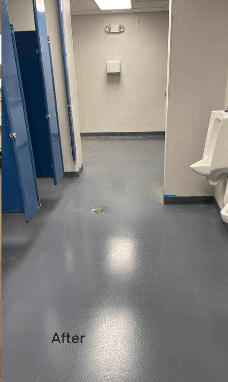 Sink and mirror wall after renovation with updated surfaces and lighting-ready finishes.